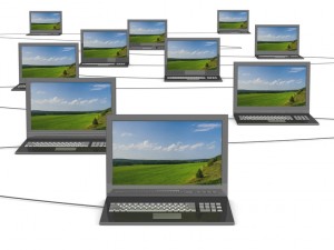 Conceptual image of a network from laptops. 3D illustrations.